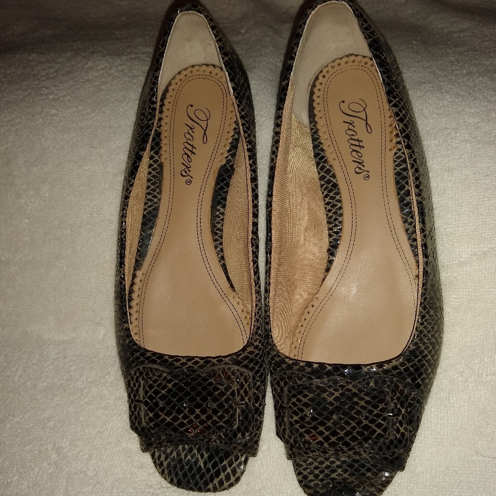 Trotter  snakeskin wedge with peep toe.
